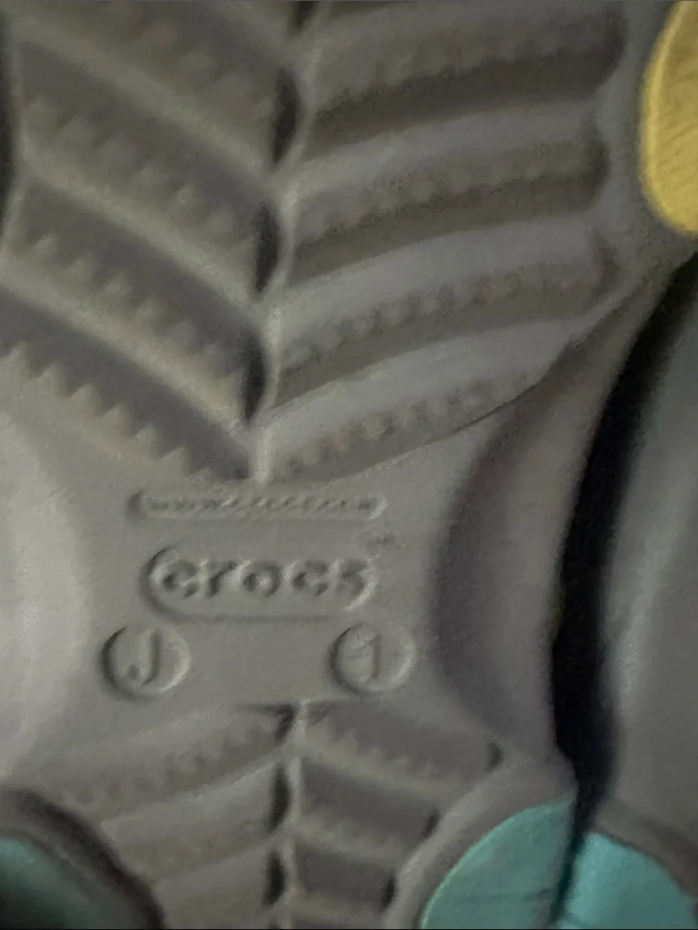 CROCS all terrain Clogs in Gray with Yellow Heel Strap kids size J1